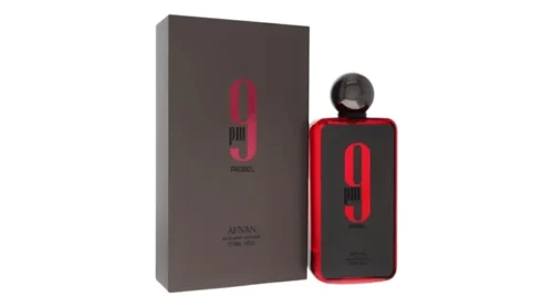 Perfume 9PM Rebel Eau de Parfum 100 ml unisex. Aroma intenso y audaz con notas especiadas, dulces y amaderadas. Ideal para quienes buscan destacar.